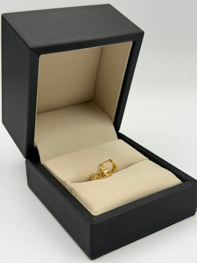 Candonga lisa con aberturas Oro amarillo 18k 0,96 Gr / 1 Cm