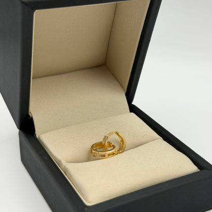 Candonga lisa con aberturas Oro amarillo 18k 1,38 Gr / 1,2 Cm