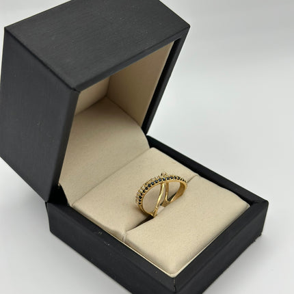Anillo infinito circones blancos y negros Oro amarillo 18k / Talla 5 3/4 / 2,48 Gr