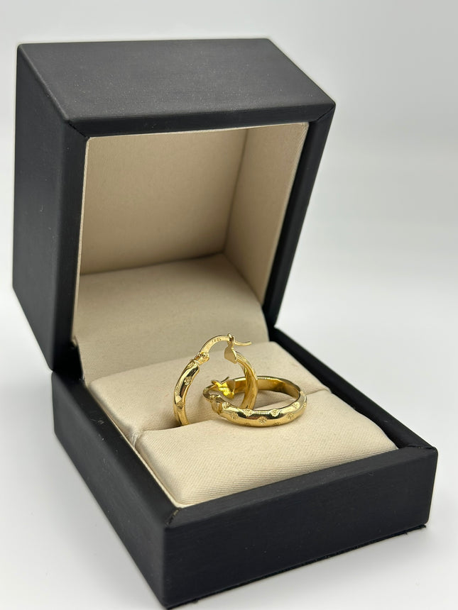 Candonga lisa punteada Oro amarillo 18k 2,46 Gr / 2,2 Cm