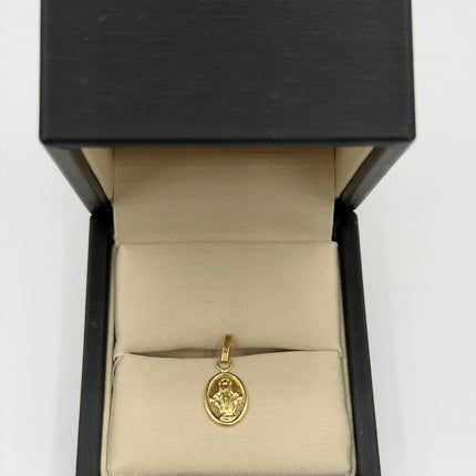 Dije virgen milagrosa ovalado Oro amarillo 18k 0,47 Gr / 12 mm / 1,4 Cm