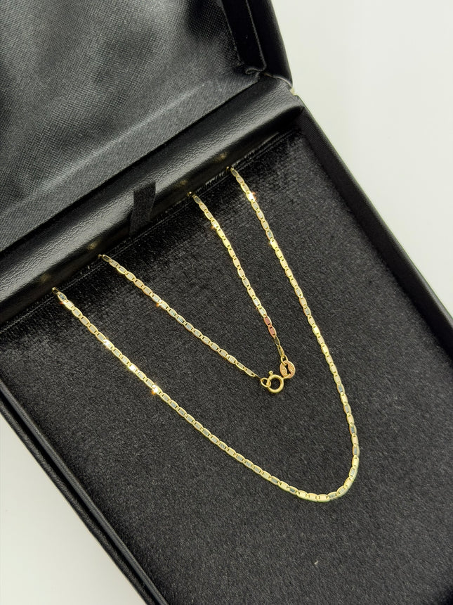 Cadena It plana Oro amarillo y Oro blanco 18k +3 / 1,51 Gr / 1,45 mm / 45 Cm